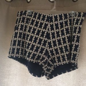 navy and white chino style shorts